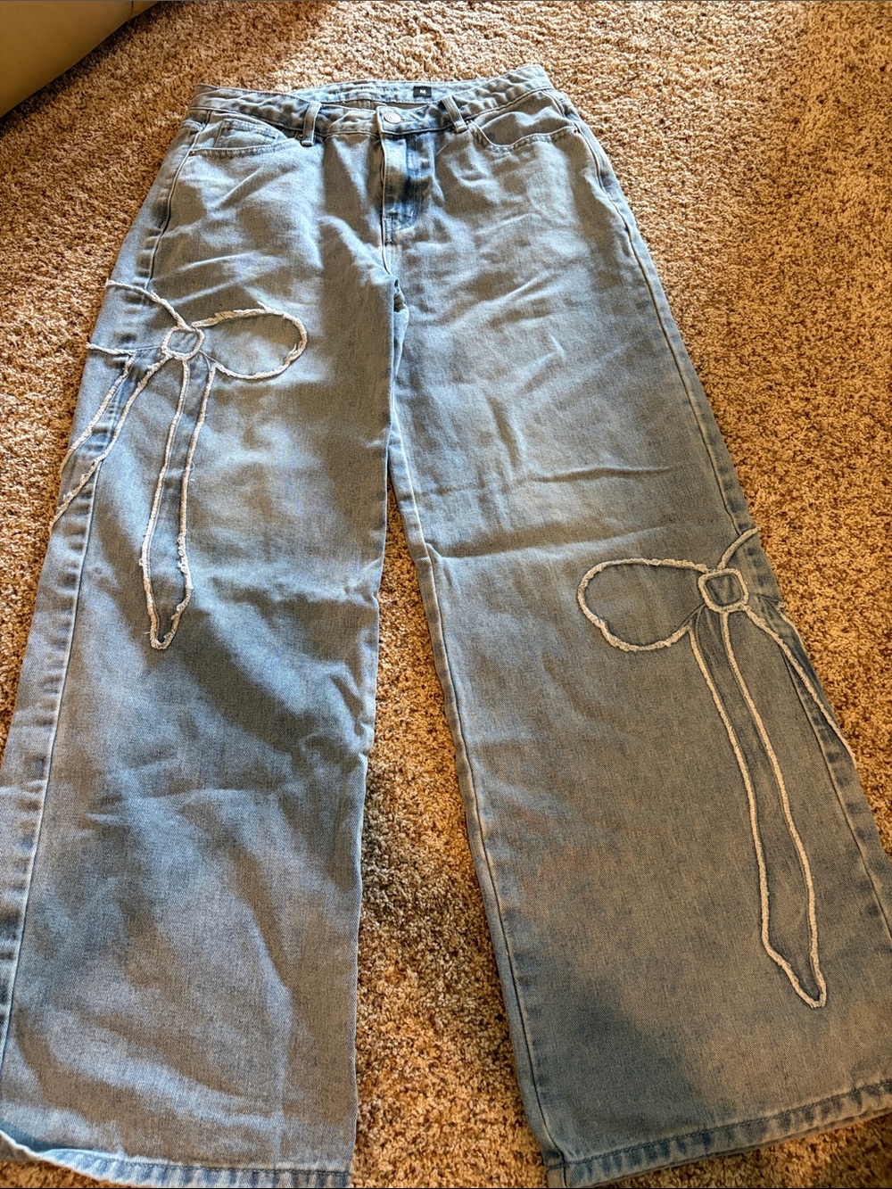 Light Blue Wide-Leg Jeans with Bow Stitch Detail - Women